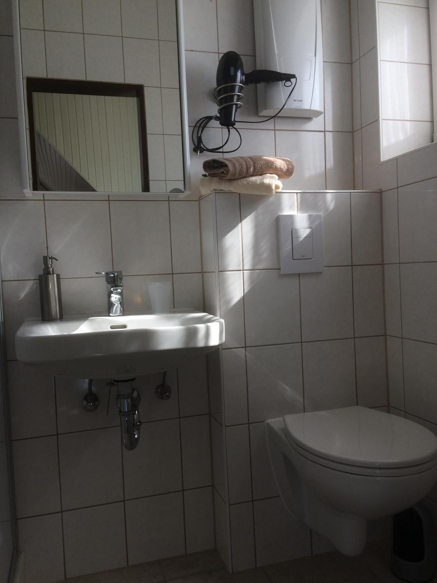 Huus Störtebeker Panzió Dornumersiel Szoba fotó